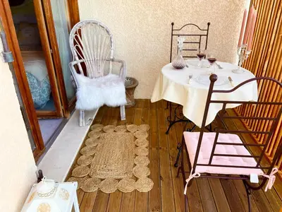 Coin salon dans l'établissement Le Boudoir, inclus petit déjeuner