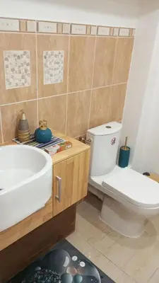 Salle de bains dans l'établissement L'océane