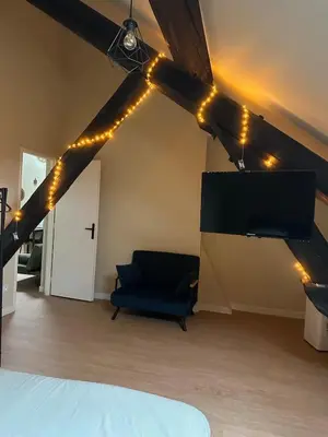 Un ou plusieurs lits dans un hébergement de l'établissement Appartement cosy gare chateaucreux