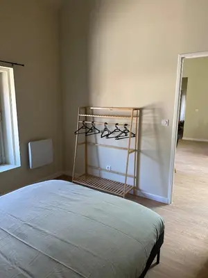 Un ou plusieurs lits dans un hébergement de l'établissement Appartement 2 chambres gare chateaucreux