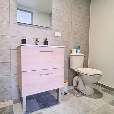 Salle de bains dans l'établissement L'Aloha