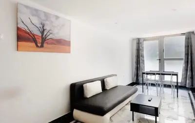 Coin salon dans l'établissement Appartement - Lyon 6th - Brotteaux