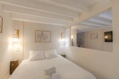 Un ou plusieurs lits dans un hébergement de l'établissement Cosy et Design Brotteaux - Massena