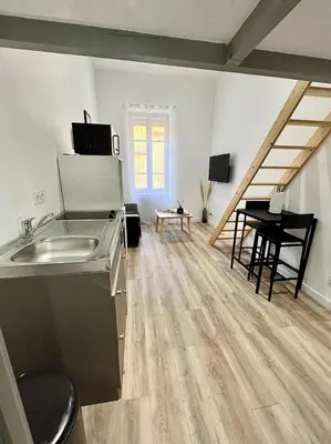 Télévision ou salle de divertissement dans l'établissement Appartement proche centre