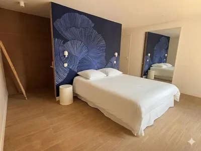 Un ou plusieurs lits dans un hébergement de l'établissement Appartment with terrace and Jacuzzi Pyramid view