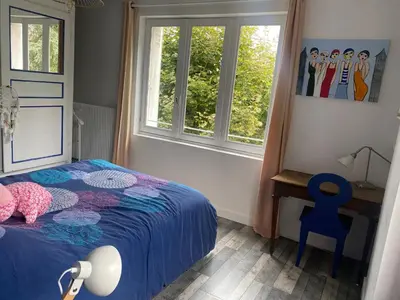 Un ou plusieurs lits dans un hébergement de l'établissement Chambre dans villa les terrasses