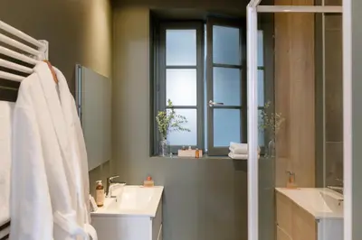 Salle de bains dans l'établissement MiHotel Gailleton