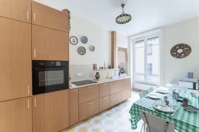 Cuisine ou kitchenette dans l'établissement Rétro Brotteaux - Proche Parc de la Tête-d'Or