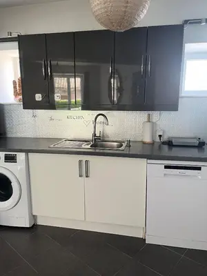 Cuisine ou kitchenette dans l'établissement Spacieux appartement idéal séjour pro famille