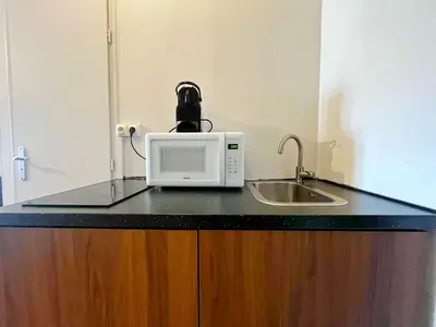 Cuisine ou kitchenette dans l'établissement Suite Olney
