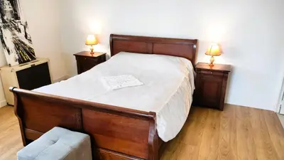 Un ou plusieurs lits dans un hébergement de l'établissement Dépendance cocooning bon standing Ampuis