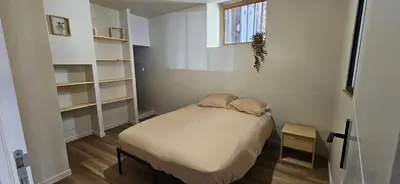 Un ou plusieurs lits dans un hébergement de l'établissement Charmant appartement au cœur du centre historique