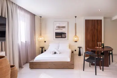 Un ou plusieurs lits dans un hébergement de l'établissement Jardin Secret - Love Room avec Balnéo