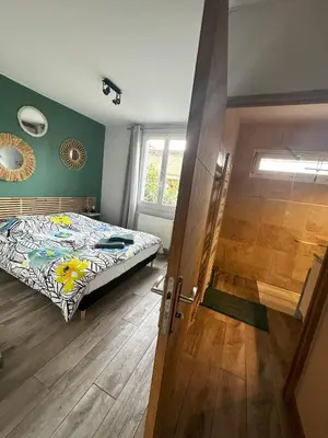 Un ou plusieurs lits dans un hébergement de l'établissement Art de Recevoir - Douce Escapade à Lyon 8 - Appartement Lumineux avec Terrasse & Climatisation