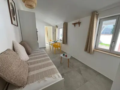 Un ou plusieurs lits dans un hébergement de l'établissement La lodge de la gare