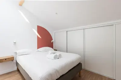 Un ou plusieurs lits dans un hébergement de l'établissement Zest Terracotta Villeurbanne