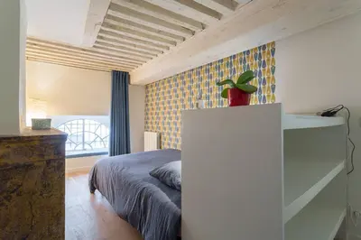 Un ou plusieurs lits dans un hébergement de l'établissement Smartstay Syrah - Centre-ville