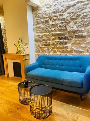 Coin salon dans l'établissement Le cosy pierre scize