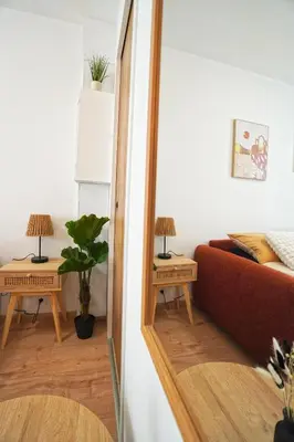 Un ou plusieurs lits dans un hébergement de l'établissement Studio neuf parking gratuit 15 minutes de Lyon