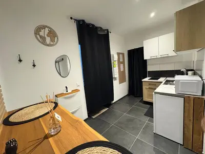 Cuisine ou kitchenette dans l'établissement Appartement Romantique Exceptionnel