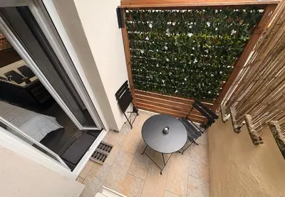 Coin salon dans l'établissement Appartement Romantique Exceptionnel