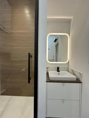 Salle de bains dans l'établissement Apple suite - studio Lyon