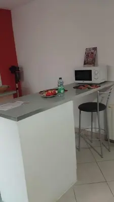 Cuisine ou kitchenette dans l'établissement Colombine