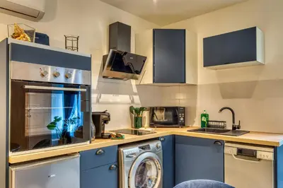 Cuisine ou kitchenette dans l'établissement La Parenthèse - T2 calme et climatisé