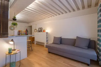 Coin salon dans l'établissement Smartstay Chardonnay - Centre ville