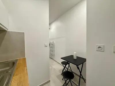 Cuisine ou kitchenette dans l'établissement Cocon magic-Jacuzzi & Netflix