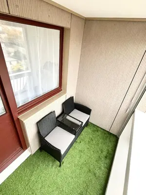 Coin salon dans l'établissement Cozy and Modern Apartment with View