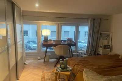 Coin salon dans l'établissement 2 chambres 4 pers Métro & PartDieu à 5 min