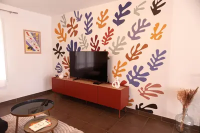 Télévision ou salle de divertissement dans l'établissement Gite Matisse