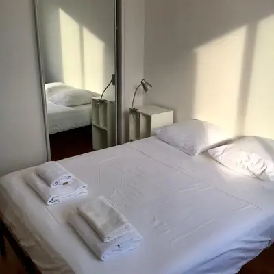 Un ou plusieurs lits dans un hébergement de l'établissement T3 cozy Saint Genis Laval - balcony - quiet - HLS