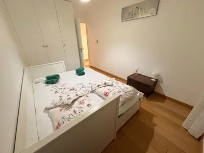 Un ou plusieurs lits dans un hébergement de l'établissement Grand appartement luxueux - Parc de la tête d'Or - Interdit aux événements