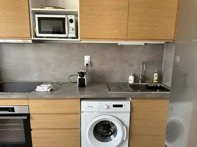 Cuisine ou kitchenette dans l'établissement T2 cosy gare de Villeurbanne,Part-dieu