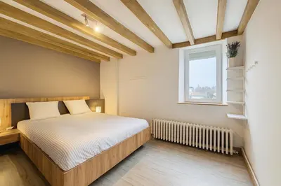 Un ou plusieurs lits dans un hébergement de l'établissement Maison de la Roche