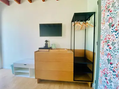 Télévision ou salle de divertissement dans l'établissement Studio à la campagne