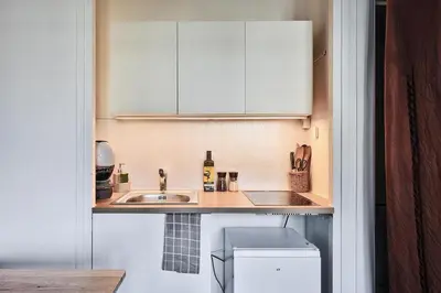 Cuisine ou kitchenette dans l'établissement Chaleureux T2 à 15 min de Lyon