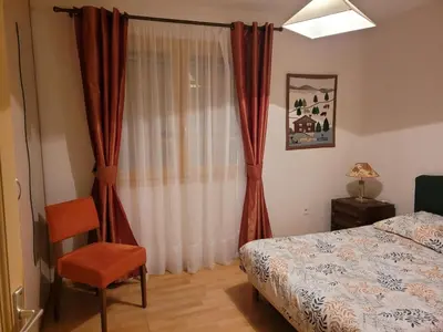 Un ou plusieurs lits dans un hébergement de l'établissement Appartement spacieux résidentiel proche de Vienne Lyon sud