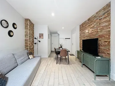 Télévision ou salle de divertissement dans l'établissement Appartement confortable Oullins centre