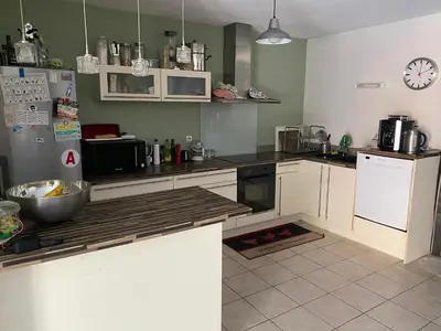 Cuisine ou kitchenette dans l'établissement Chambre dans la maison de Loïc