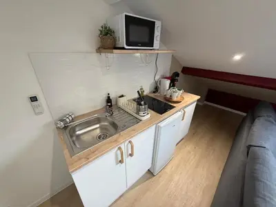 Cuisine ou kitchenette dans l'établissement T2 Neptune x4 people NEW Gare parilly
