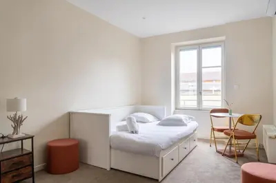 Un ou plusieurs lits dans un hébergement de l'établissement Maison d'exception au coeur de Lyon avec piscine