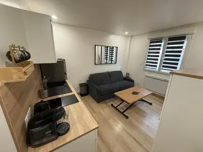 Coin salon dans l'établissement Studio cozy à Lagnieu