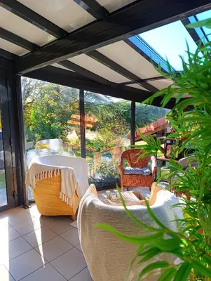 Coin salon dans l'établissement Maison d'hôtes Ma Parenthèse