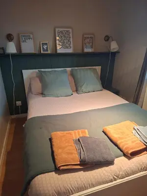 Un ou plusieurs lits dans un hébergement de l'établissement Maison de village en beaujolais pierres dorées