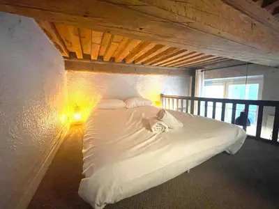 Un ou plusieurs lits dans un hébergement de l'établissement L'alcôve des Terreaux - Hôtel de Ville & Opéra