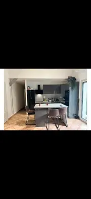 Cuisine ou kitchenette dans l'établissement Maison mitoyenne