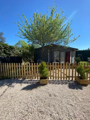 Jardin de l'établissement Chalet bois cosy indépendant Saint Jean de Niost